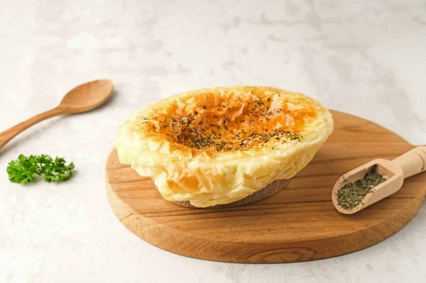 Come fare una zuppa di farro e porri con crostini di pane all'aglio?